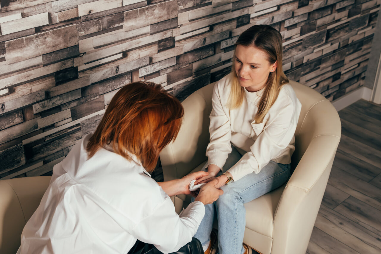 Psychologist talking to patient. 